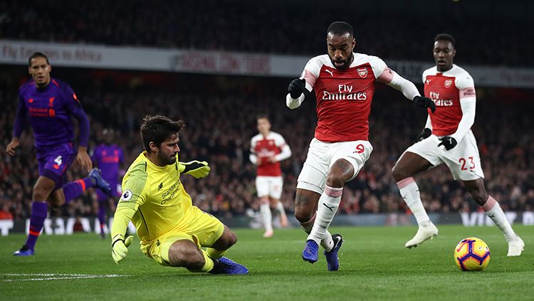 Alexandre Lacazette menyamakan ketertinggalan Arsenal dari Liverpool menjadi 1-1. Copyright: © Getty Images/Julian Finney