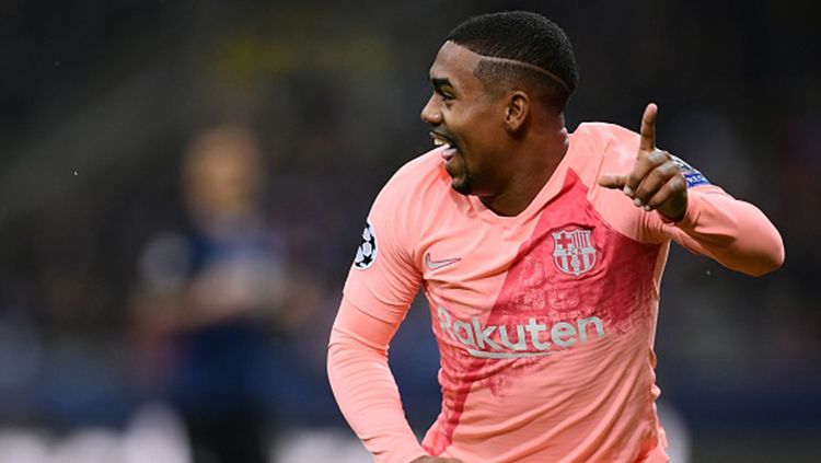 Arsenal sudah mengambil langkah untuk mendatangkan pemain sayap Barcelona, Malcom, pada bursa transfer musim panas 2019. MARCO BERTORELLO/AFP/Getty Images. Copyright: © MARCO BERTORELLO/AFP/Getty Images