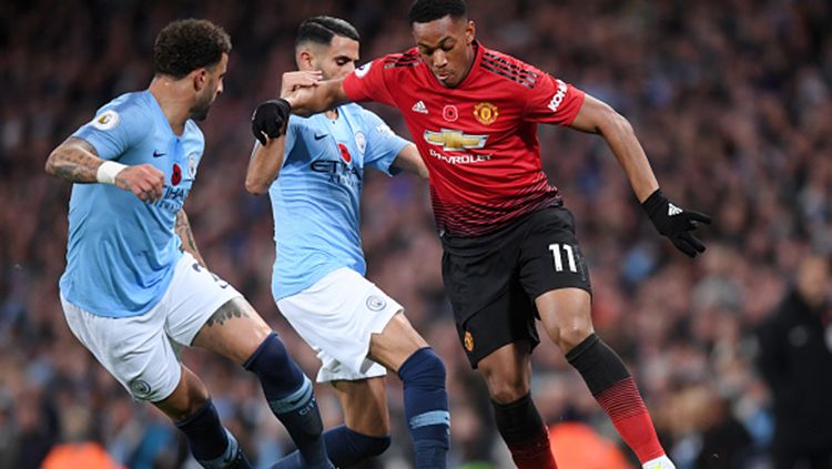 Berikut tersaji prediksi pertandingan derbi sepak bola semifinal Piala Liga Inggris 2019-2020 antara Manchester City vs Manchester United di Etihad Stadium. Copyright: © Laurence Griffiths/Getty Images