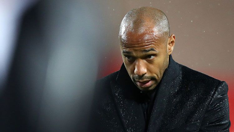 Legenda Arsenal yang sempat merumput untuk Barcelona, Thierry Henry, mengungkapkan dalang di balik mandulnya Lionel Messi bersama Paris Saint-Germain (PSG). Copyright: © Getty Images