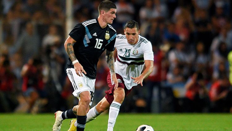 Pertandingan antara Argentina vs Meksiko bisa disaksikan melalui siaran live streaming. Copyright: © Jam Media/Getty Images