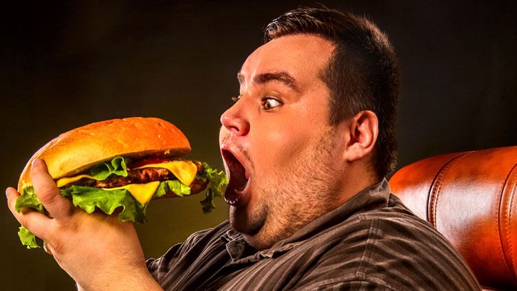 Ilustrasi orang gemuk saat sedang makan. Copyright: © Rocky Mountain Healthy Living