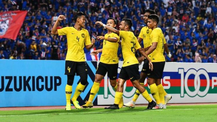 Skuat Timnas Malaysia saat merayakan gol. Copyright: © AFF