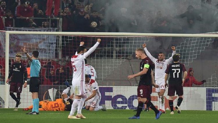 Pemain Olympiacos merayakan gol ke gawang AC Milan di laga pamungkas Grup F Liga Europa. Copyright: © getty images
