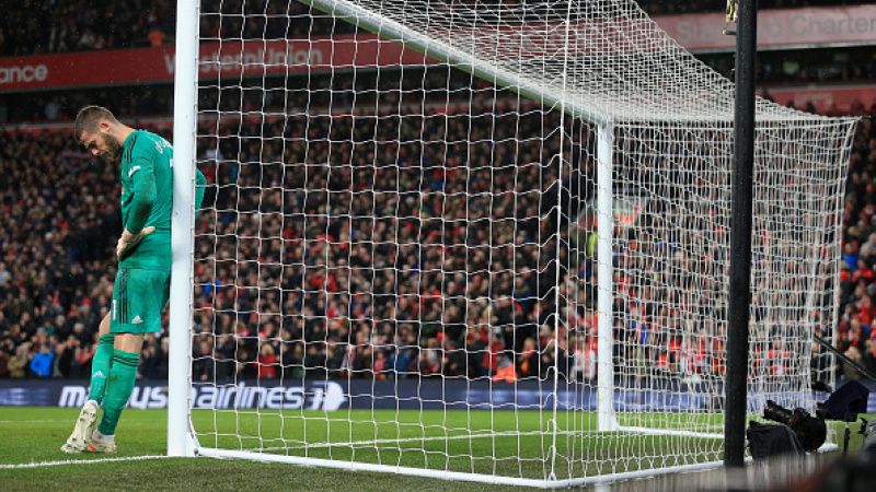 David De Gea tampak pasrah pasca Manchester United dipermalukan Everton. Copyright: © INDOSPORT