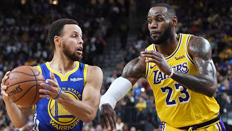 Bintang basket Golden State Warriors, Stephen Curry dan LeBron James, bintang basket LA Lakers. Copyright: © Getty Images