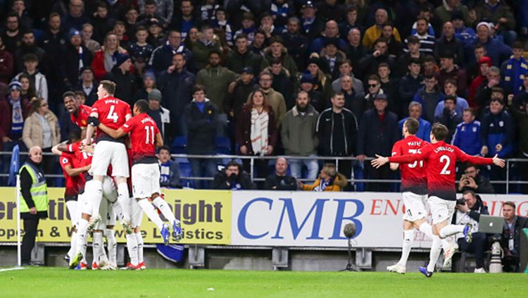 Para pemain Man United merayakan gol. Copyright: © Cardiff City FC/Getty Images