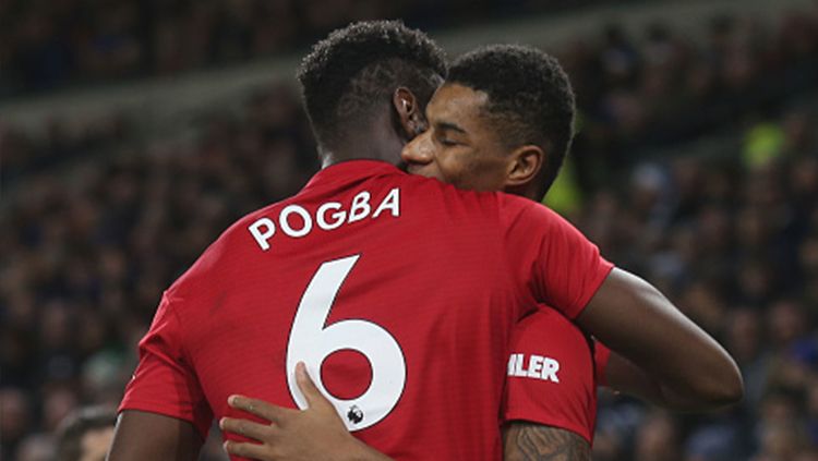 Marcus Rashford berselebrasi bersama Pogba usai mencetak gol. Copyright: © Matthew Peters/Man Utd via Getty Images