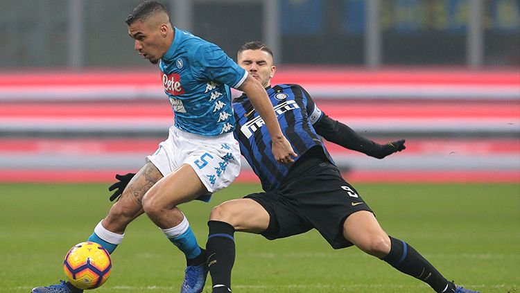 Marques Loureiro dibayang-bayangi Mauro Icardi (kanan). Copyright: © Emilio Andreoli/Getty Images