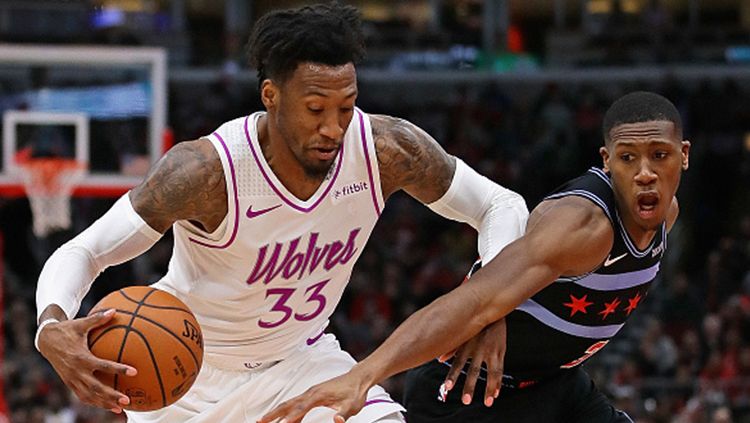 Robert Covington (no33) berusaha melewati Kris Dunn Copyright: © Getty Images