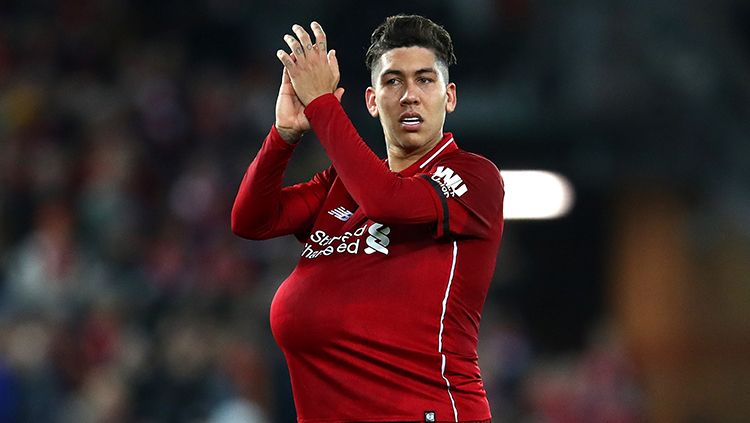 Roberto Firmino mencetak hattrick dan berhak mendapatkan bola laga. Copyright: © Getty Images