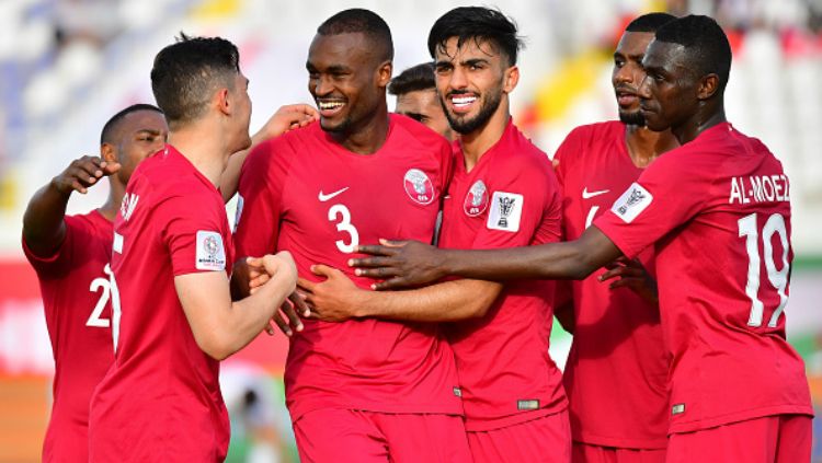 Timnas Qatar selebrasi atas gol ke gawang Korea Utara di Piala Asia 2019. Copyright: © INDOSPORT