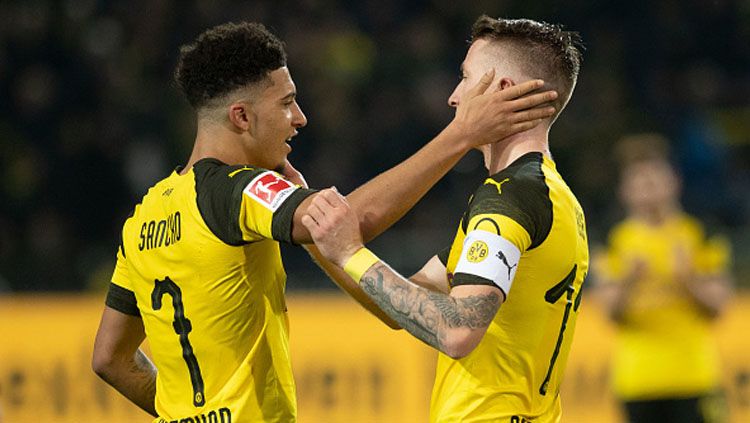 2 Bintang Borussia Dortmund, Jadon Sancho (kiri) dan Marco Reus. Copyright: © INDOSPORT