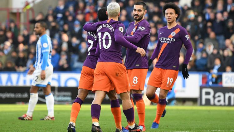 Selebrasi para pemain Manchester City usai cetak gol ke gawang Huddersfield Town, Minggu (20/01/19). Copyright: © Getty Images