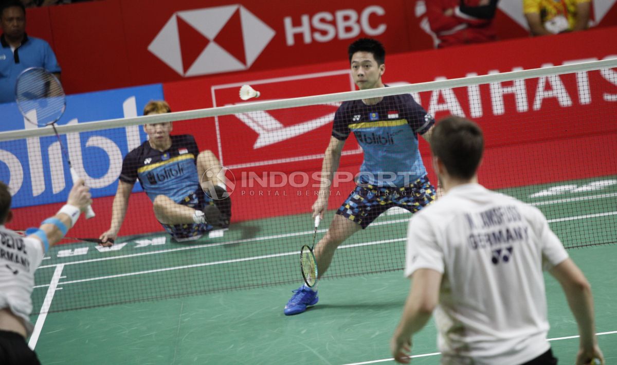 Kevin Sanjaya Sukamuljo/Marcus Fernaldi Gideon menghancurkan pasangan duo Jerman, Mark Lamsfuss/Marvin Seidel bisa merebut gelar juara Indonesia Masters dari tangan The Minions. Copyright: © Herry Ibrahim/INDOSPORT