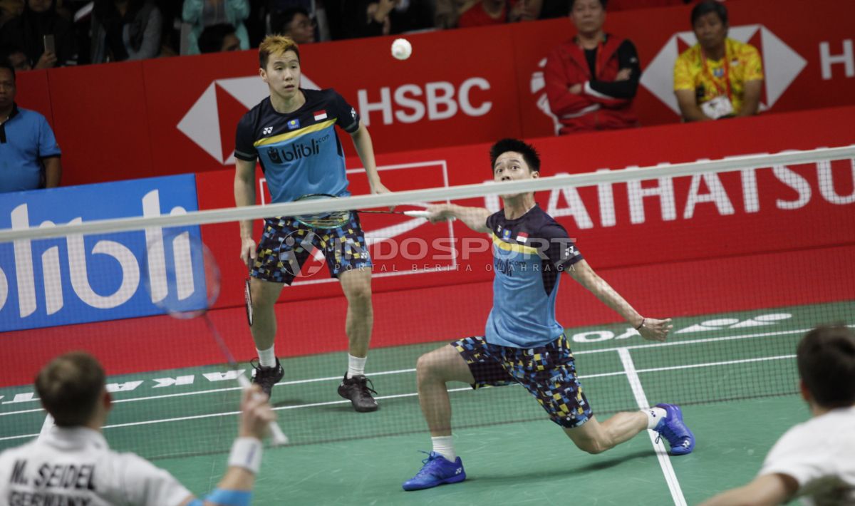 Kevin Sanjaya Sukamuljo/Marcus Fernaldi Gideon menghancurkan pasangan duo Jerman, Mark Lamsfuss/Marvin Seidel bisa merebut gelar juara Indonesia Masters dari tangan The Minions. Copyright: © Herry Ibrahim/INDOSPORT