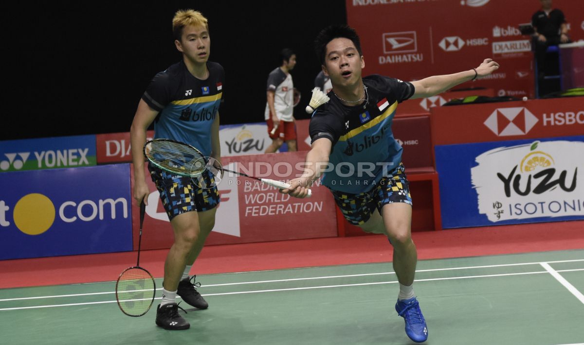 Kevin/Marcus saat tampil di Indonesia Masters 2019. Copyright: © INDOSPORT/Herry Ibrahim