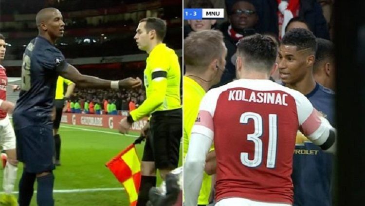 Para pemain Man United terkena lemparan koin dari penggemar Arsenal di Emirates Copyright: © Daily Star