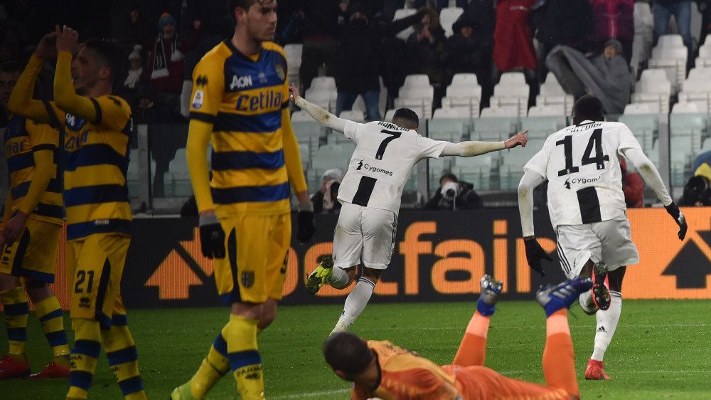 Selebrasi pemain Cristiano Ronaldo usai mencetak gol ke gawang Parma Copyright: © Getty Images