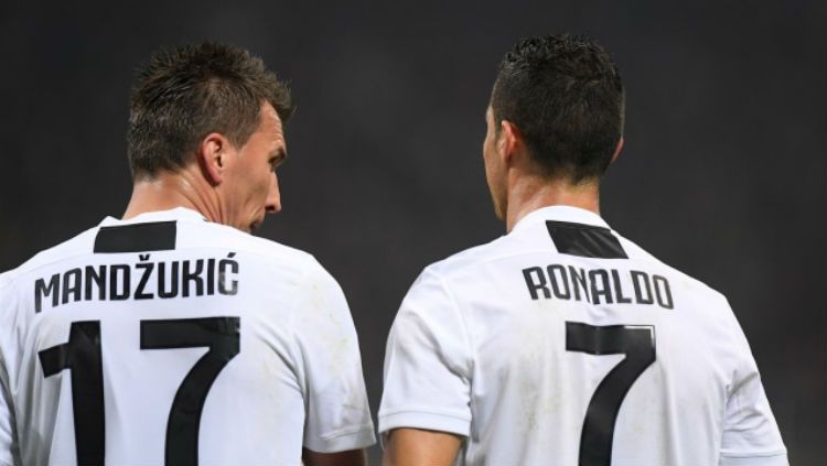 Mario Madzukic dan Cristiano Ronaldo. Copyright: © GettyImages