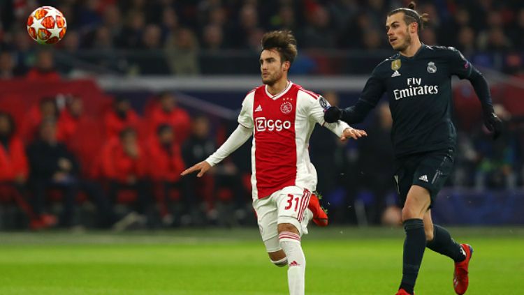 Ajax vs Real Madrid di leg pertama babak 16 besar Liga Champions 2018/19. Copyright: © GettyImages