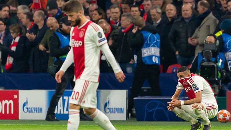 Para pemain Ajax Amsterdam harus menerima kenyataan jika mereka kalah dari Real Madrid. Copyright: © GettyImages