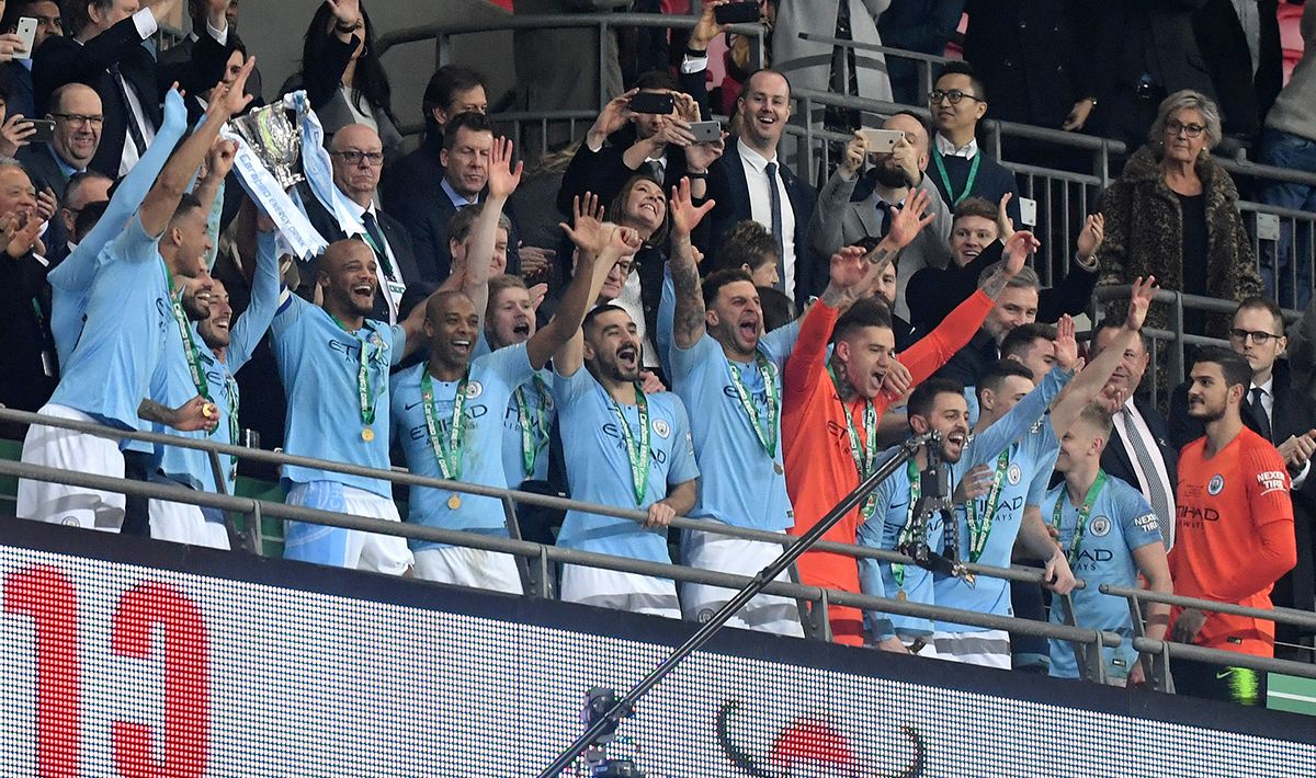 Pemain Manchester City merayakan kemenangan sebagai juara Piala Liga Inggris Copyright: © GettyImages
