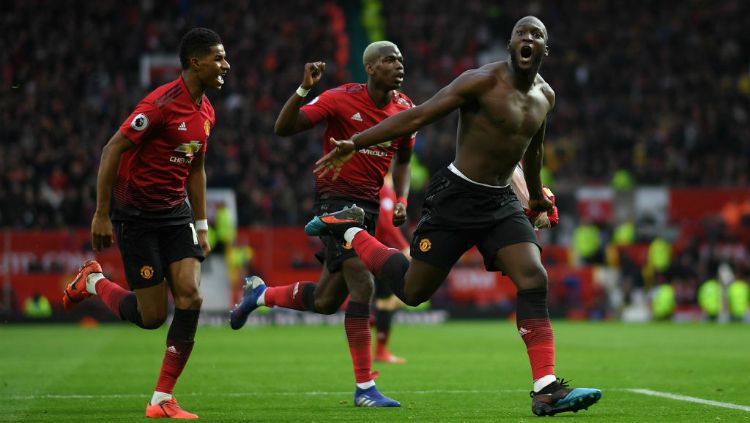Romelu Lukaku selebrasi gol usai membawa Manchester United menang atas Southampton, Sabtu (02/03/19). Copyright: © INDOSPORT