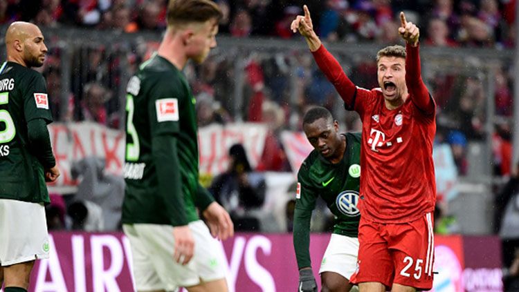 Pemain Bayern Munchen, Thomas Muller, mengancam akan hengkang seiring namanya tak lagi menjadi pilihan utama pelatih Niko Kovac Copyright: © INDOSPORT
