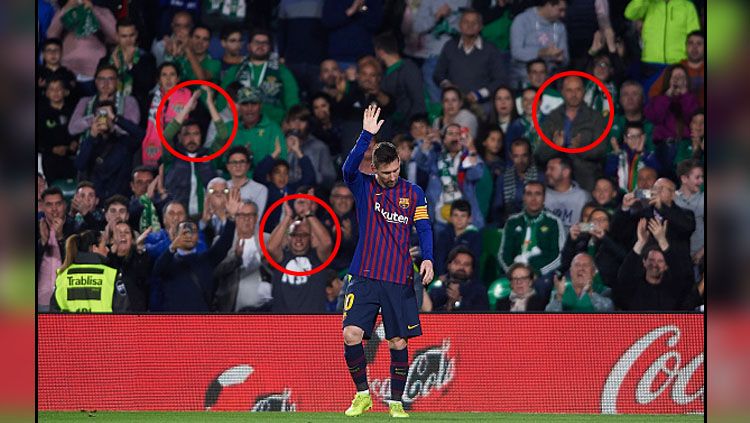 Pemain megabintang Barcelona, Lionel Messi mendapat standing applause dari fans Real Betis. Copyright: © INDOSPORT