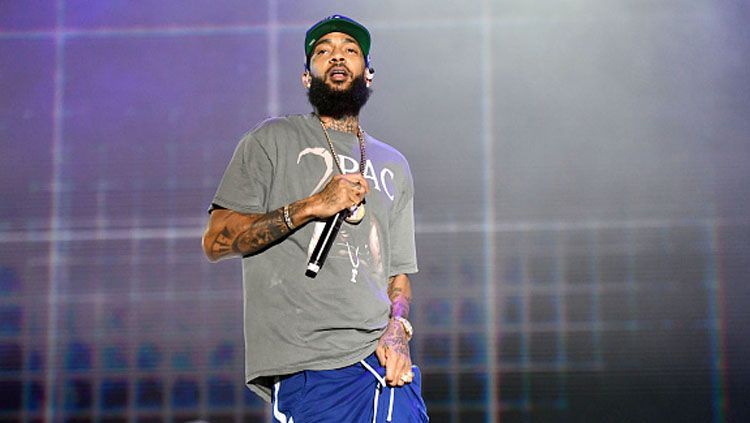 Nipsey Hussle, rapper asal AS yang merupakan fans LA Lakers. Copyright: © Scott Dudelson/Getty Images