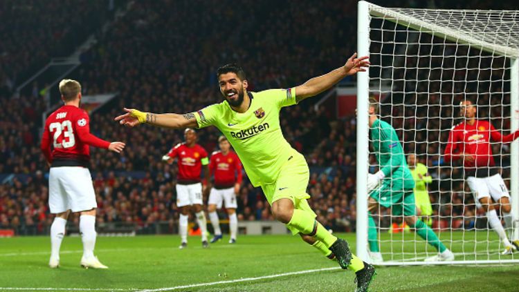 Luis Suarez merayakan golnya ke gawang Manchester United. Copyright: © Getty Images