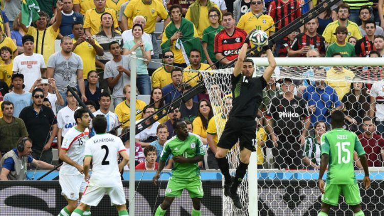 Alireza Haghighi di Piala Dunia 2014 Copyright: © JEWEL SAMAD/AFP/Getty Images