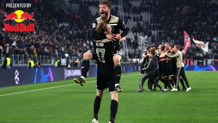 Daley Blind dan Lasse Schone meluapkan kegembiraan usai lolos ke semifinal Liga Champions. Copyright: © Michael Steele/Getty Images