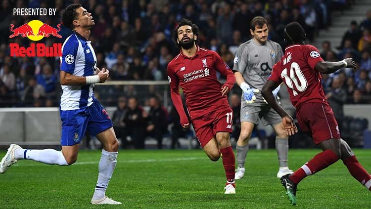 Ekspresi Mohamed Salah usai mencetak gol ke gawang FC Porto. Foto: PAUL ELLIS/AFP/Getty Images Copyright: © PAUL ELLIS/AFP/Getty Images