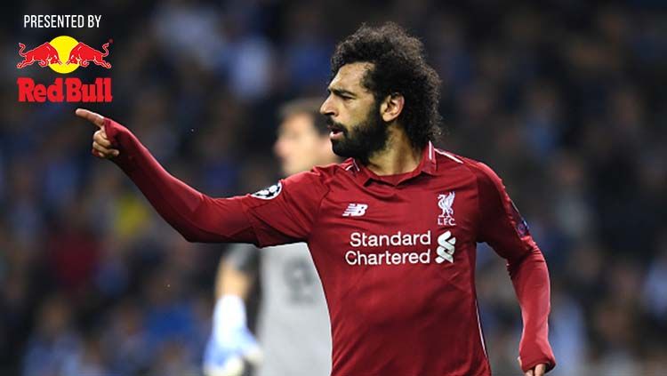 Pemain Liverpool, Mohamed Salah dari usai mencetak gol kedua untuk timnya ke gawang Porto. Foto: Matthias Hangst/Getty Images Copyright: © Matthias Hangst/Getty Images
