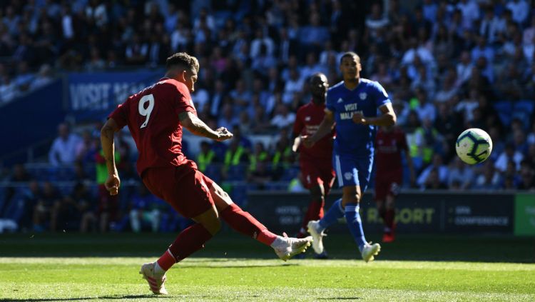 Roberto Firmino gagal memanfaatkan peluang yang ia dapatkan di depan gawang Cardiff. Copyright: © Stu Forster/Getty Images