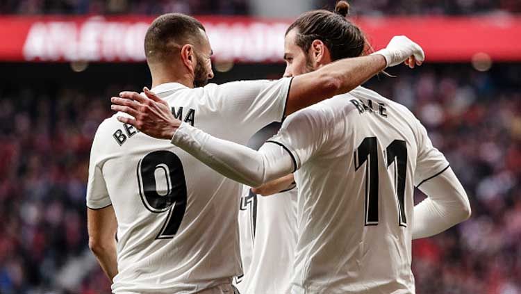 2 penggawa Real Madrid, Karim Benzema (kiri) dan Gareth Bale merayakan selebrasi bersama. Copyright: © Leonardo Prieto/GETTYIMAGES