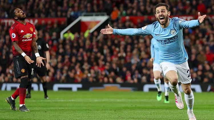 Bintang Manchester City, Bernardo Silva, mengaku kelak ingin kembali bergabung dengan klub masa kecilnya, Benfica. Copyright: © Catherine Ivill / Getty Images