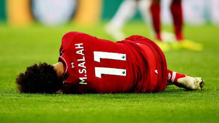 Mohamed Salah mengalami cedera kepala saat pertandingan melawan Newcastle United pada akhir pekan kemarin. Copyright: © Chris Brunskill/Fantasista/Getty Images