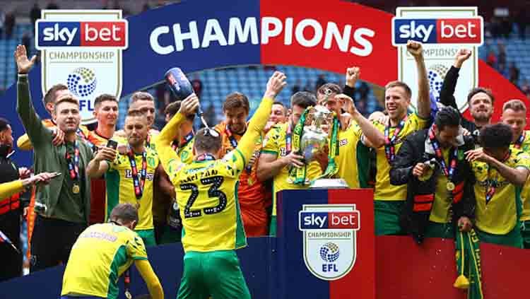 Klub yang berkompetisi di kasta teratas Liga Inggris, Norwich City, memberikan konfirmasi jika satu pemainnya terindikasi positif virus corona. Copyright: © Malcolm Couzens/GettyImages