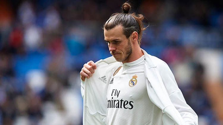 Pemain sepak bola Real Madrid, Gareth Bale, kabarnya meminta pihak klub untuk mendepaknya ke Asia pada bursa transfer tahun depan. Copyright: © Quality Sport Images / GettyImages