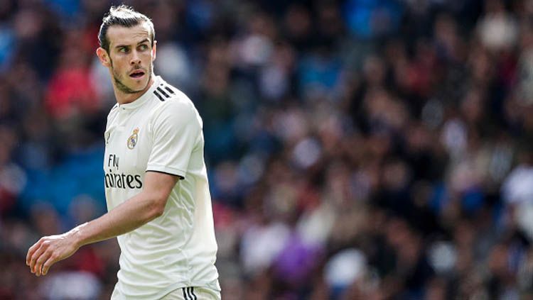 Teka-teki yang menyelimuti masa depan Gareth Bale akhirnya terjawab. Winger berusia 32 tahun tersebut bakal meninggalkan Real Madrid untuk balikan dengan mantan. Copyright: © Soccrates Images/GettyImages