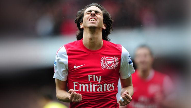 Pemain Arsenal, Yossi Benayoun sewaktu membela Arsenal. Foto: Adam Davy - EMPICS/PA Images via Getty Images Copyright: © Adam Davy - EMPICS/PA Images via Getty Images