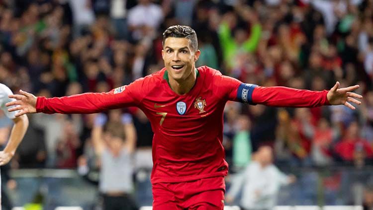 Selebrasi pemain megabintang sekaligus kapten Timnas Portugal, Cristiano Ronaldo. Copyright: © TF-Images/GettyImages