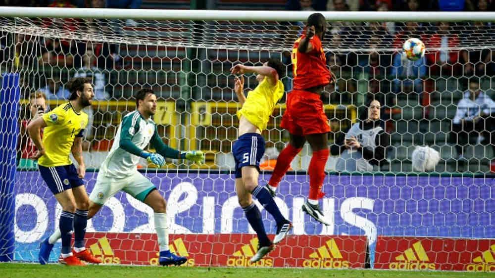 Proses gol pertama Lukaku di laga Belgia vs Skotlandia, Jimmy Bolcina / Photonews via Getty Images Copyright: © Jimmy Bolcina / Photonews via Getty Images