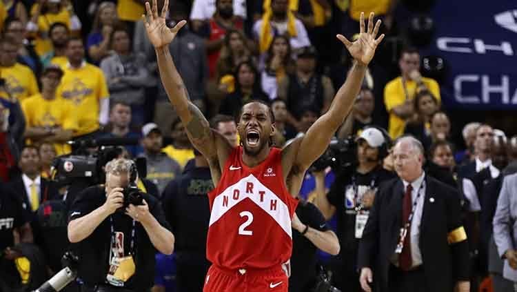 Forward Raptors, Kahwi Leonard, berselebrasi usai Toronto Raptors menjadi juara NBA 2019. Copyright: © Ezra Shaw/Getty Images