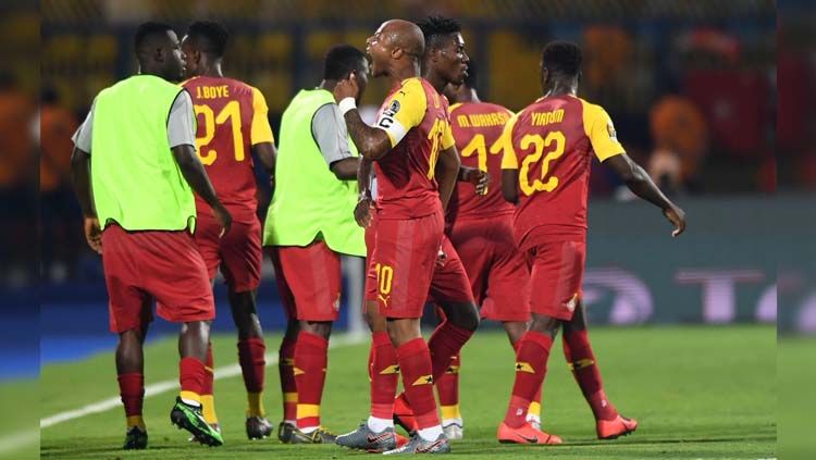 Andre Ayew merayakan gol pada laga Ghana vs Benin di Piala Afrika 2019, Rabu (26/06/19). Copyright: © Twitter/@24SaatFutbolcom
