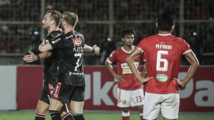 Selebrasi pemain Bali United, Ilija Spasojević usai membobol gawang Badak Lampung, Minggu (30/06/2019). Foto: Twitter@BaliUtd Copyright: © Twitter@BaliUtd