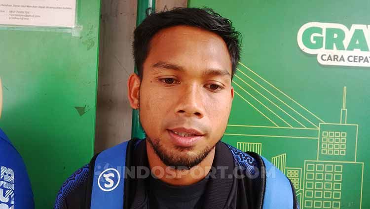 Pemain belakang Persib, Saepulloh Maulana ditemui di Bandara Husein Sastranegara, Kota Bandung, Senin (22/07/2019). Copyright: © Arif Rahman/INDOSPORT
